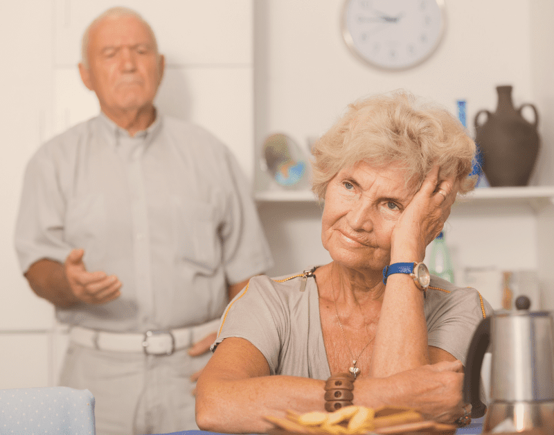 older couple in the kitchen not getting along